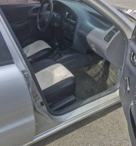 Серый Дэу Ланос, объемом двигателя 1.5 л и пробегом 220 тыс. км за 2200 $, фото 4 на Automoto.ua