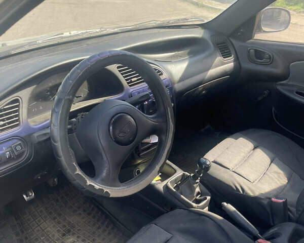 Сірий Деу Ланос, об'ємом двигуна 1.5 л та пробігом 250 тис. км за 999 $, фото 4 на Automoto.ua