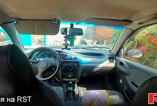 Сірий Деу Ланос, об'ємом двигуна 1.5 л та пробігом 204 тис. км за 2150 $, фото 3 на Automoto.ua