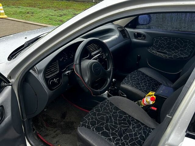 Серый Дэу Ланос, объемом двигателя 1.5 л и пробегом 300 тыс. км за 1300 $, фото 7 на Automoto.ua