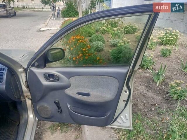 Сірий Деу Ланос, об'ємом двигуна 1.5 л та пробігом 100 тис. км за 1300 $, фото 4 на Automoto.ua