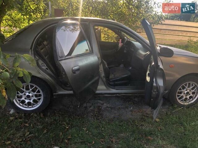 Сірий Деу Ланос, об'ємом двигуна 1.5 л та пробігом 220 тис. км за 1500 $, фото 7 на Automoto.ua