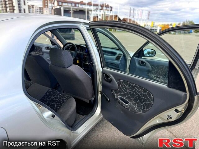 Сірий Деу Ланос, об'ємом двигуна 1.5 л та пробігом 250 тис. км за 1700 $, фото 9 на Automoto.ua