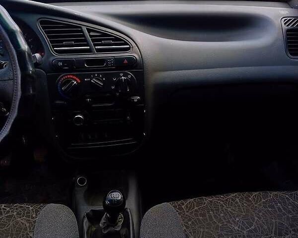 Сірий Деу Ланос, об'ємом двигуна 1.5 л та пробігом 180 тис. км за 1700 $, фото 4 на Automoto.ua