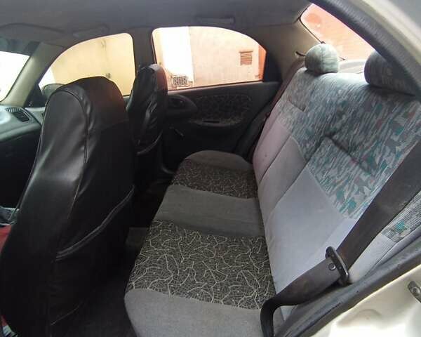 Серый Дэу Ланос, объемом двигателя 1.5 л и пробегом 196 тыс. км за 1000 $, фото 6 на Automoto.ua