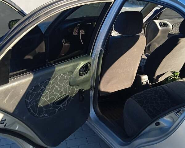 Сірий Деу Ланос, об'ємом двигуна 1.5 л та пробігом 231 тис. км за 2200 $, фото 8 на Automoto.ua