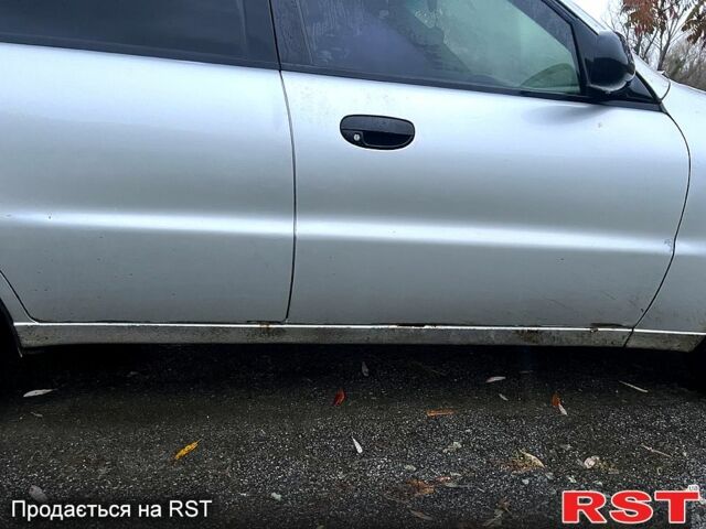 Серый Дэу Ланос, объемом двигателя 1.5 л и пробегом 397 тыс. км за 1350 $, фото 8 на Automoto.ua