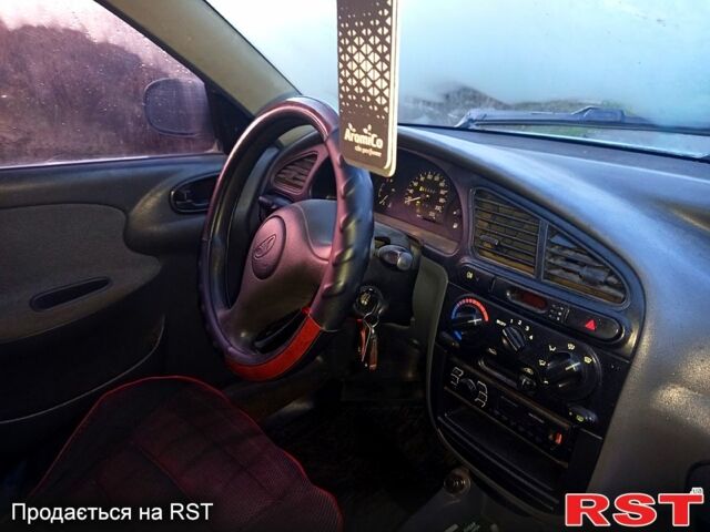 Серый Дэу Ланос, объемом двигателя 1.6 л и пробегом 200 тыс. км за 1500 $, фото 11 на Automoto.ua