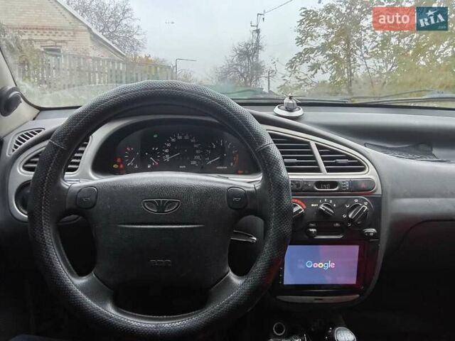 Серый Дэу Ланос, объемом двигателя 1.6 л и пробегом 224 тыс. км за 2000 $, фото 1 на Automoto.ua