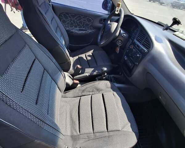 Сірий Деу Ланос, об'ємом двигуна 1.5 л та пробігом 205 тис. км за 2500 $, фото 26 на Automoto.ua