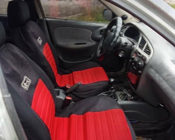 Серый Дэу Ланос, объемом двигателя 1.6 л и пробегом 224 тыс. км за 2000 $, фото 4 на Automoto.ua