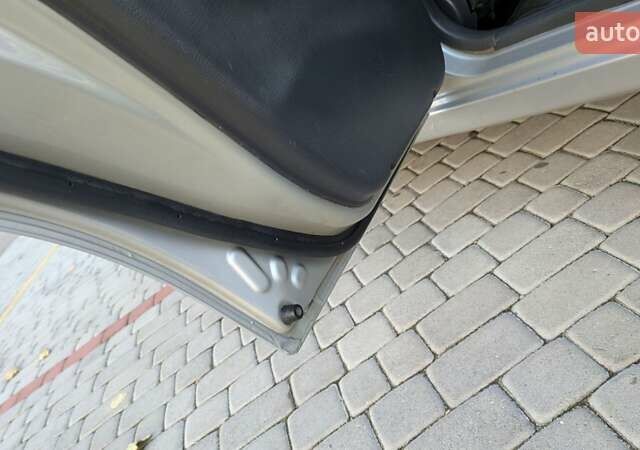 Деу Ланос 2004 у Старокостянтинів на Automoto.ua Сірий Деу Ланос, об'ємом двигуна 1.5 л та пробігом 183 тис. км за 2100 $, фото 5 на Automoto.ua