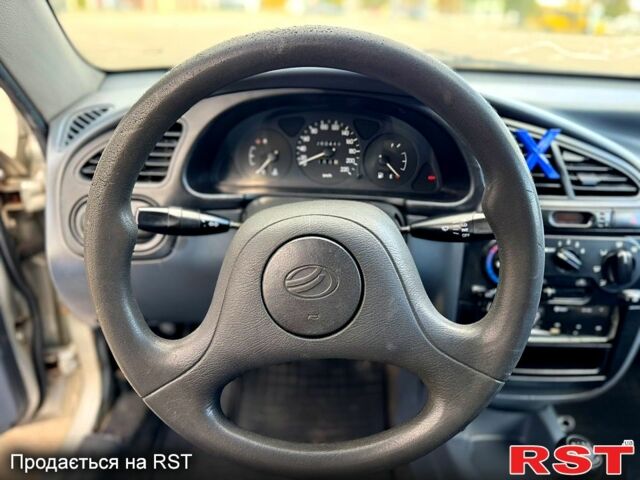 Сірий Деу Ланос, об'ємом двигуна 1.5 л та пробігом 250 тис. км за 1700 $, фото 6 на Automoto.ua