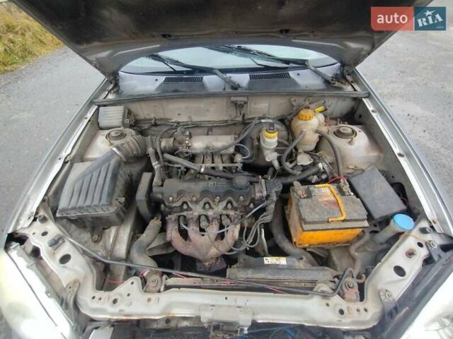 Серый Дэу Ланос, объемом двигателя 1.5 л и пробегом 300 тыс. км за 750 $, фото 5 на Automoto.ua