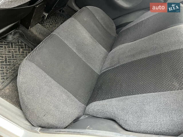 Серый Дэу Ланос, объемом двигателя 1.5 л и пробегом 237 тыс. км за 1950 $, фото 14 на Automoto.ua