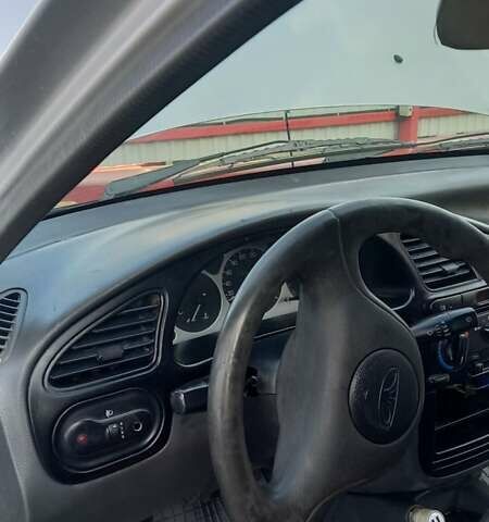 Серый Дэу Ланос, объемом двигателя 1.5 л и пробегом 290 тыс. км за 2100 $, фото 35 на Automoto.ua