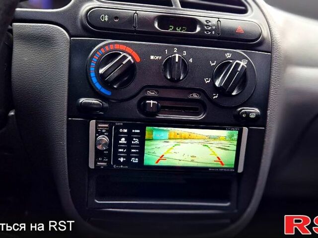 Серый Дэу Ланос, объемом двигателя 1.5 л и пробегом 205 тыс. км за 3100 $, фото 13 на Automoto.ua