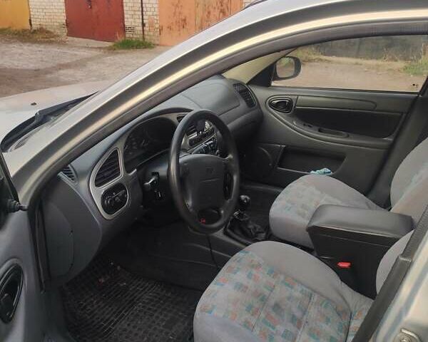 Серый Дэу Ланос, объемом двигателя 1.6 л и пробегом 238 тыс. км за 2599 $, фото 3 на Automoto.ua