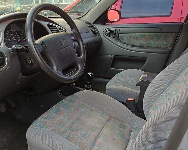 Сірий Деу Ланос, об'ємом двигуна 1.6 л та пробігом 212 тис. км за 2500 $, фото 6 на Automoto.ua