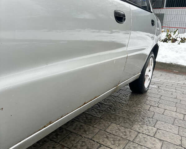 Сірий Деу Ланос, об'ємом двигуна 1.5 л та пробігом 200 тис. км за 2000 $, фото 11 на Automoto.ua