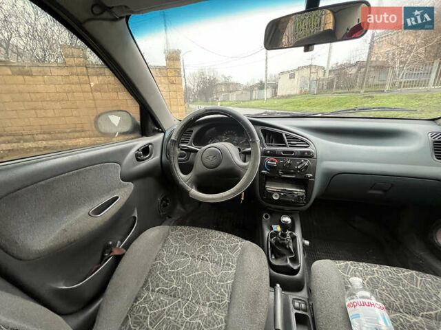 Сірий Деу Ланос, об'ємом двигуна 1.5 л та пробігом 200 тис. км за 1350 $, фото 4 на Automoto.ua