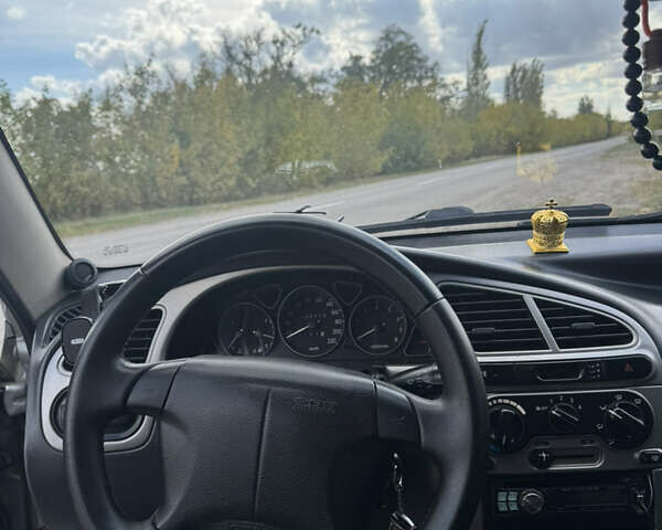 Сірий Деу Ланос, об'ємом двигуна 1.5 л та пробігом 200 тис. км за 3200 $, фото 9 на Automoto.ua