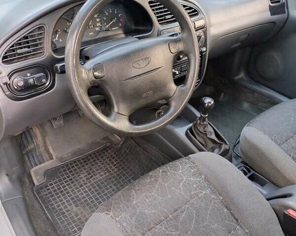 Сірий Деу Ланос, об'ємом двигуна 1.6 л та пробігом 231 тис. км за 2399 $, фото 7 на Automoto.ua