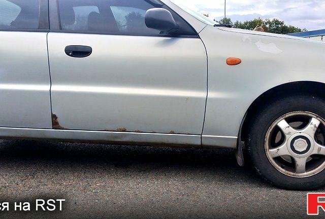 Серый Дэу Ланос, объемом двигателя 1.6 л и пробегом 213 тыс. км за 1500 $, фото 1 на Automoto.ua