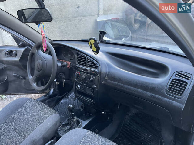 Серый Дэу Ланос, объемом двигателя 1.5 л и пробегом 220 тыс. км за 1200 $, фото 12 на Automoto.ua