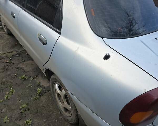 Серый Дэу Ланос, объемом двигателя 1.6 л и пробегом 268 тыс. км за 2000 $, фото 2 на Automoto.ua