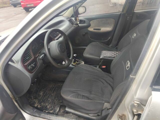 Серый Дэу Ланос, объемом двигателя 1.5 л и пробегом 150 тыс. км за 1100 $, фото 5 на Automoto.ua