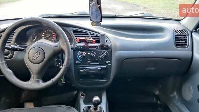 Серый Дэу Ланос, объемом двигателя 1.5 л и пробегом 262 тыс. км за 1750 $, фото 10 на Automoto.ua