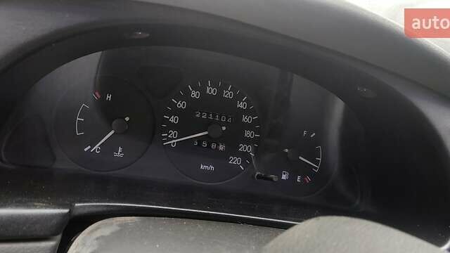 Сірий Деу Ланос, об'ємом двигуна 1.5 л та пробігом 221 тис. км за 1183 $, фото 8 на Automoto.ua