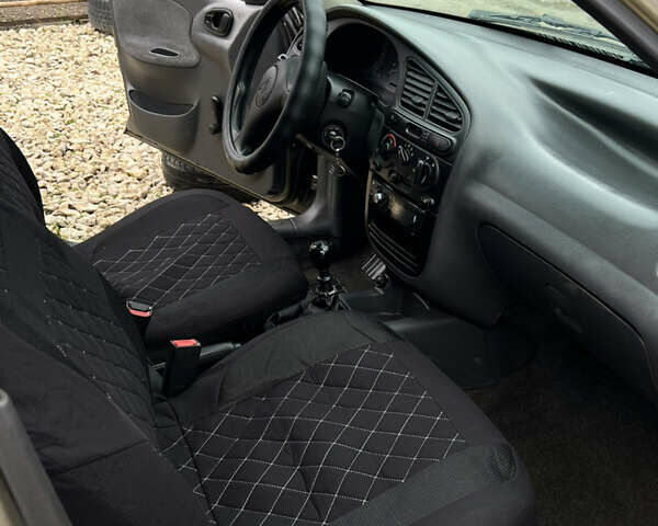 Сірий Деу Ланос, об'ємом двигуна 1.5 л та пробігом 210 тис. км за 2490 $, фото 22 на Automoto.ua