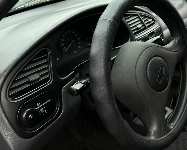 Сірий Деу Ланос, об'ємом двигуна 1.5 л та пробігом 210 тис. км за 2490 $, фото 15 на Automoto.ua