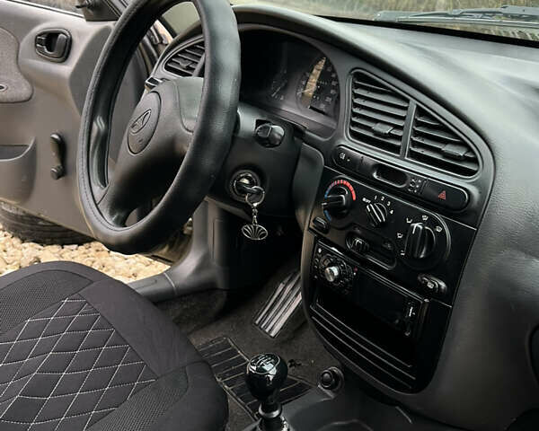 Сірий Деу Ланос, об'ємом двигуна 1.5 л та пробігом 210 тис. км за 2490 $, фото 24 на Automoto.ua