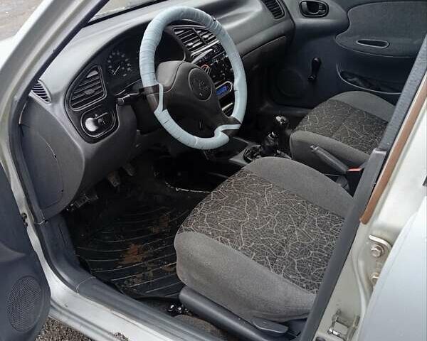 Сірий Деу Ланос, об'ємом двигуна 1.5 л та пробігом 172 тис. км за 1250 $, фото 7 на Automoto.ua