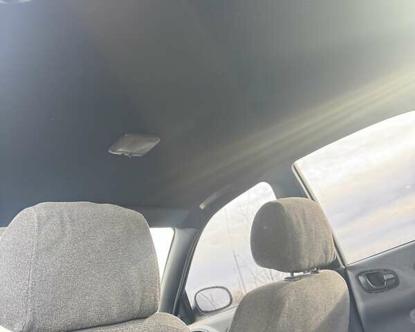 Серый Дэу Ланос, объемом двигателя 1.5 л и пробегом 197 тыс. км за 1300 $, фото 11 на Automoto.ua