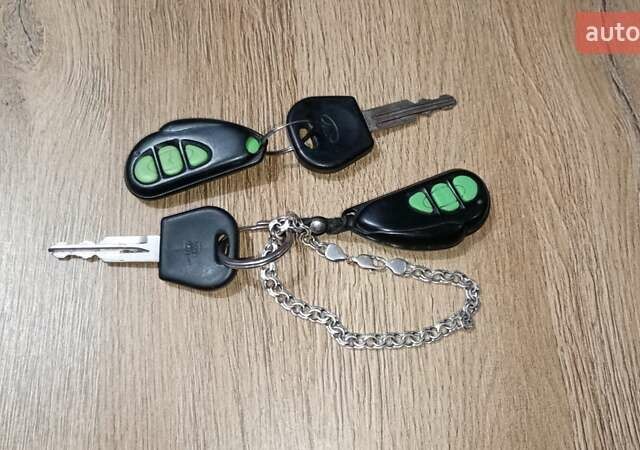 Серый Дэу Ланос, объемом двигателя 1.5 л и пробегом 262 тыс. км за 1750 $, фото 12 на Automoto.ua