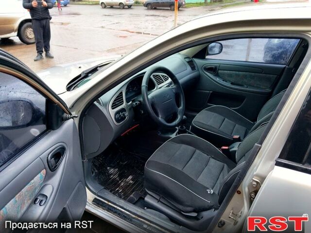 Серый Дэу Ланос, объемом двигателя 1.6 л и пробегом 140 тыс. км за 1500 $, фото 3 на Automoto.ua