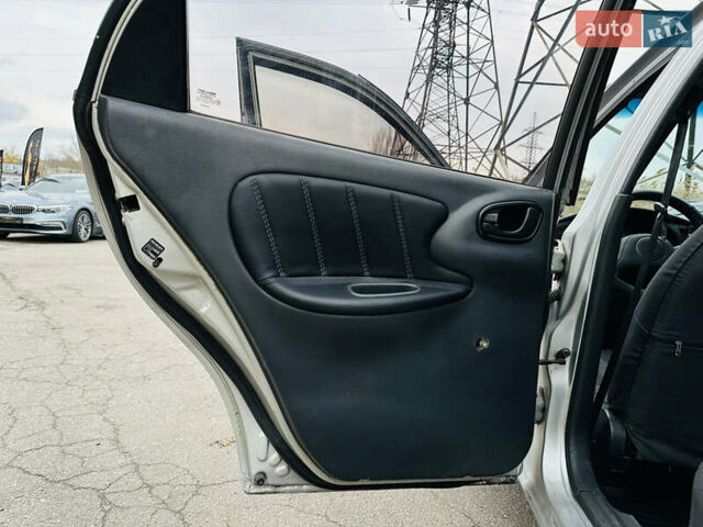 Сірий Деу Ланос, об'ємом двигуна 1.5 л та пробігом 350 тис. км за 2200 $, фото 17 на Automoto.ua