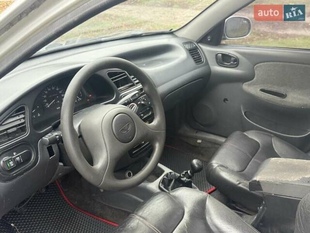 Сірий Деу Ланос, об'ємом двигуна 1.5 л та пробігом 180 тис. км за 1750 $, фото 6 на Automoto.ua