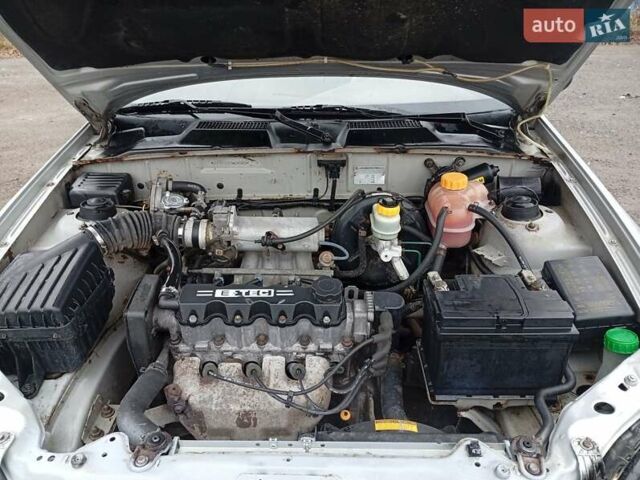 Сірий Деу Ланос, об'ємом двигуна 1.5 л та пробігом 172 тис. км за 1250 $, фото 6 на Automoto.ua