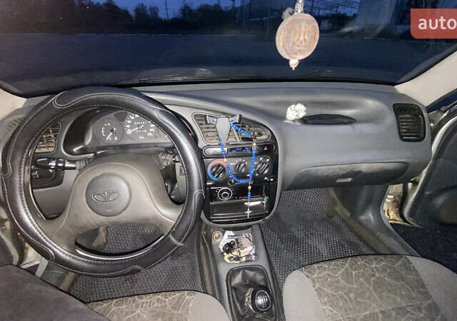 Серый Дэу Ланос, объемом двигателя 1.5 л и пробегом 306 тыс. км за 1600 $, фото 20 на Automoto.ua