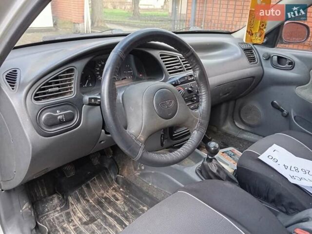 Сірий Деу Ланос, об'ємом двигуна 1.5 л та пробігом 150 тис. км за 1700 $, фото 6 на Automoto.ua