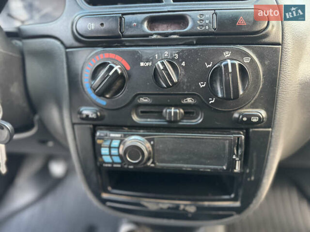 Сірий Деу Ланос, об'ємом двигуна 1.5 л та пробігом 176 тис. км за 2400 $, фото 35 на Automoto.ua