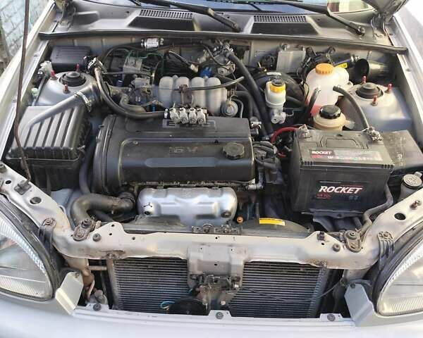 Сірий Деу Ланос, об'ємом двигуна 1.6 л та пробігом 231 тис. км за 2399 $, фото 1 на Automoto.ua