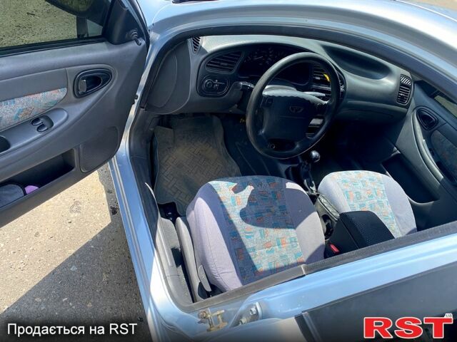 Сірий Деу Ланос, об'ємом двигуна 1.5 л та пробігом 210 тис. км за 3100 $, фото 5 на Automoto.ua