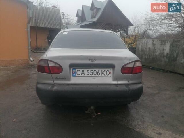 Серый Дэу Ланос, объемом двигателя 1.5 л и пробегом 317 тыс. км за 1950 $, фото 3 на Automoto.ua