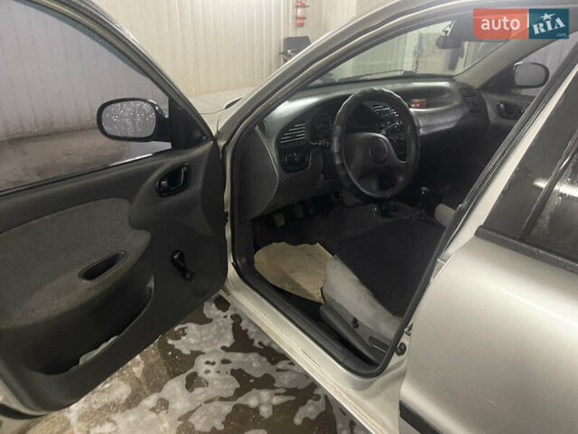 Серый Дэу Ланос, объемом двигателя 1.5 л и пробегом 242 тыс. км за 2500 $, фото 14 на Automoto.ua